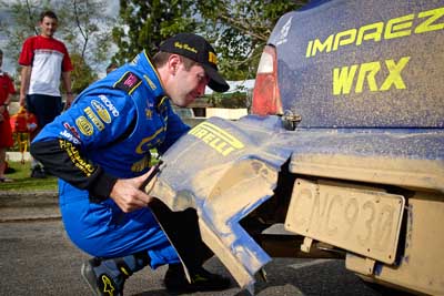 1;4-June-2005;ARC;Australia;Australian-Rally-Championship;Coates-Rally-Queensland;Cody-Crocker;Imbil;QLD;Queensland;Subaru-Impreza-WRX;Sunshine-Coast;Topshot;auto;damage;motorsport;portrait;racing;repair