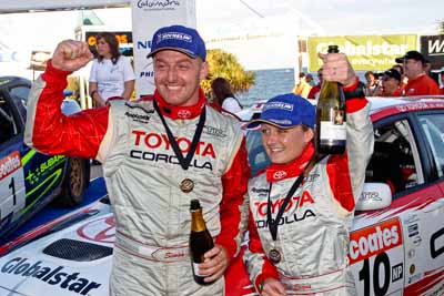 050605ARC;5-June-2005;ARC;Australia;Australian-Rally-Championship;Caloundra;Coates-Rally-Queensland;QLD;Queensland;Simon-Evans;Sue-Evans;Sunshine-Coast;afternoon;auto;motorsport;official-finish;podium;portrait;racing