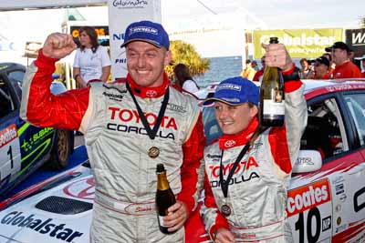 050605ARC;5-June-2005;ARC;Australia;Australian-Rally-Championship;Caloundra;Coates-Rally-Queensland;QLD;Queensland;Simon-Evans;Sue-Evans;Sunshine-Coast;afternoon;auto;motorsport;official-finish;podium;portrait;racing