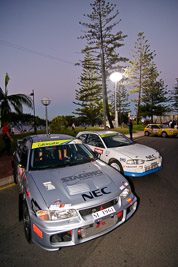 26;27;16-June-2006;ARC;Australia;Australian-Rally-Championship;Elysia-Kruper;Evo-3;Ken-Garrioch;Leigh-Garrioch;Mitsubishi-Lancer;Mitsubishi-Lancer-Evolution-III;Mitsubishi-Mirage;Mooloolaba;QLD;Queensland;Simon-Jansen;Sunshine-Coast;atmosphere;auto;ceremonial-start;motorsport;movement;racing;sky;speed;twilight;wide-angle