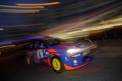 4;16-June-2006;ARC;Australia;Australian-Rally-Championship;Ford-Focus;Mark-Stacey;Michael-Guest;Mooloolaba;Pirtek-Rally-Team-Ford;QLD;Queensland;Sunshine-Coast;atmosphere;auto;ceremonial-start;motorsport;movement;racing;speed;twilight;wide-angle