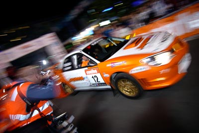 12;16-June-2006;ARC;Australia;Australian-Rally-Championship;Darren-Windus;Jonathon-Mortimer;Mooloolaba;QLD;Queensland;Subaru-Impreza-WRX;Sunshine-Coast;Topshot;atmosphere;auto;ceremonial-start;motorsport;movement;night;orange;racing;speed;wide-angle