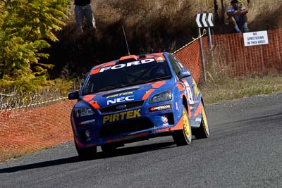 4;17-June-2006;ARC;Australia;Australian-Rally-Championship;Ford-Focus;Imbil;Mark-Stacey;Michael-Guest;Pirtek-Rally-Team-Ford;QLD;Queensland;Sunshine-Coast;auto;motorsport;racing;tarmac;telephoto