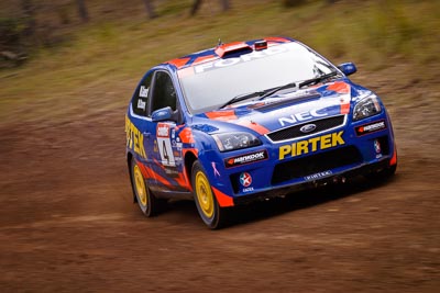 4;18-June-2006;ARC;Australia;Australian-Rally-Championship;Ford-Focus;Imbil;Mark-Stacey;Michael-Guest;Off‒Road;Pirtek-Rally-Team-Ford;QLD;Queensland;Sunshine-Coast;auto;motorsport;movement;racing;speed;telephoto