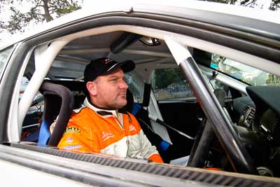 18-June-2006;ARC;Australia;Australian-Rally-Championship;Darren-Windus;Imbil;QLD;Queensland;Sunshine-Coast;atmosphere;auto;cockpit;in‒car;motorsport;movement;portrait;racing;service-park;speed;wide-angle