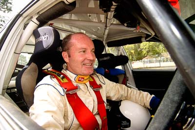 18-June-2006;ARC;Australia;Australian-Rally-Championship;Imbil;QLD;Queensland;Stewart-Reid;Sunshine-Coast;atmosphere;auto;cockpit;in‒car;motorsport;portrait;racing;service-park;wide-angle