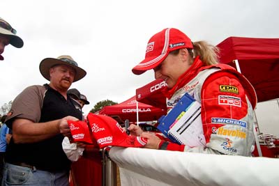 18-June-2006;ARC;Australia;Australian-Rally-Championship;Imbil;QLD;Queensland;Sue-Evans;Sunshine-Coast;atmosphere;auto;autograph;fans;motorsport;portrait;racing;service-park;signature;spectators;wide-angle