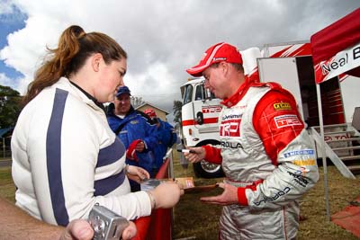 18-June-2006;ARC;Australia;Australian-Rally-Championship;Imbil;Neal-Bates;QLD;Queensland;Sunshine-Coast;atmosphere;auto;autograph;fans;motorsport;portrait;racing;service-park;signature;spectators;wide-angle