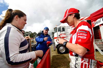 18-June-2006;ARC;Australia;Australian-Rally-Championship;Coral-Taylor;Imbil;QLD;Queensland;Sunshine-Coast;atmosphere;auto;autograph;fans;motorsport;portrait;racing;service-park;signature;spectators;wide-angle