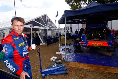 18-June-2006;ARC;Australia;Australian-Rally-Championship;Ford-Focus;Imbil;Michael-Guest;Pirtek-Rally-Team-Ford;QLD;Queensland;Sunshine-Coast;atmosphere;auto;motorsport;portrait;racing;service-park;wide-angle