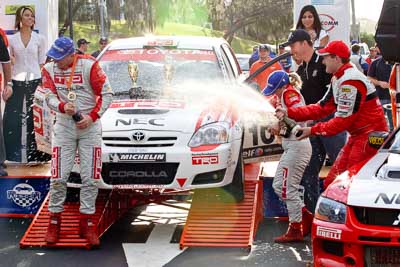 18-June-2006;ARC;Australia;Australian-Rally-Championship;Mooloolaba;QLD;Queensland;Scott-Pedder;Simon-Evans;Sue-Evans;Sunshine-Coast;atmosphere;auto;ceremonial-finish;motorsport;podium;racing;telephoto