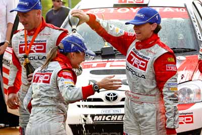 18-June-2006;ARC;Australia;Australian-Rally-Championship;Coral-Taylor;Mooloolaba;QLD;Queensland;Simon-Evans;Sue-Evans;Sunshine-Coast;atmosphere;auto;ceremonial-finish;motorsport;podium;racing;telephoto