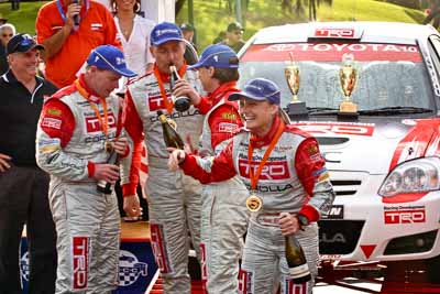 18-June-2006;ARC;Australia;Australian-Rally-Championship;Coral-Taylor;Mooloolaba;Neal-Bates;QLD;Queensland;Simon-Evans;Sue-Evans;Sunshine-Coast;Topshot;atmosphere;auto;ceremonial-finish;motorsport;podium;racing;telephoto