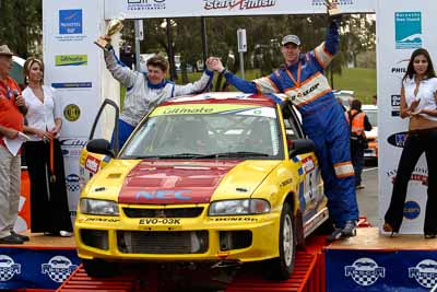 5;18-June-2006;ARC;Australia;Australian-Rally-Championship;Dale-Moscatt;Evo-3;Kelvin-Croker;Mitsubishi-Lancer;Mitsubishi-Lancer-Evolution-III;Mooloolaba;QLD;Queensland;Sunshine-Coast;auto;ceremonial-finish;motorsport;racing;telephoto