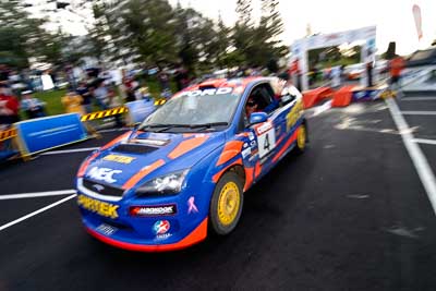 4;18-June-2006;ARC;Australia;Australian-Rally-Championship;Ford-Focus;Mark-Stacey;Michael-Guest;Mooloolaba;Pirtek-Rally-Team-Ford;QLD;Queensland;Sunshine-Coast;atmosphere;auto;ceremonial-finish;motorsport;movement;racing;speed;wide-angle