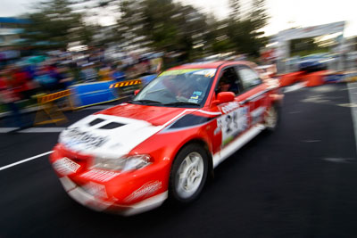 21;18-June-2006;ARC;Australia;Australian-Rally-Championship;Evo-6;Gerald-Schofield;Mitsubishi-Lancer;Mitsubishi-Lancer-Evolution-VI-RS;Mooloolaba;QLD;Queensland;Ray-Baker;Sunshine-Coast;atmosphere;auto;ceremonial-finish;motorsport;movement;racing;speed;wide-angle