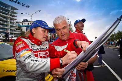 18-June-2006;ARC;Australia;Australian-Rally-Championship;Mooloolaba;QLD;Queensland;Sue-Evans;Sunshine-Coast;atmosphere;auto;autograph;ceremonial-finish;motorsport;movement;podium;portrait;racing;signature;spectator;speed;wide-angle