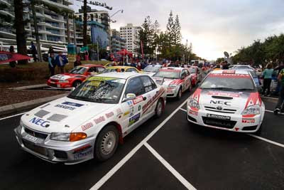 0;3;18-June-2006;ARC;Australia;Australian-Rally-Championship;Coral-Taylor;Crawford;Evo;Mitsubishi-Lancer-Evolution;Mooloolaba;Neal-Bates;QLD;Queensland;Stilling;Sunshine-Coast;Team-TRD;Toyota-Corolla-Sportivo;atmosphere;auto;ceremonial-finish;motorsport;movement;racing;speed;twilight;wide-angle