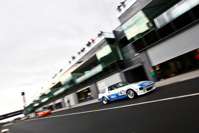 147;1979-Mazda-RX‒7;21-March-2008;Australia;Bathurst;FOSC;Festival-of-Sporting-Cars;Marque-and-Production-Sports;Mt-Panorama;NSW;New-South-Wales;Stringer;auto;motorsport;movement;pit-lane;racing;speed;wide-angle