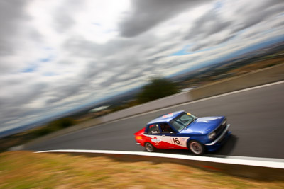 16;1970-Datsun-1600;22-March-2008;Australia;Bathurst;FOSC;Festival-of-Sporting-Cars;Improved-Production;Mark-Short;Mt-Panorama;NSW;New-South-Wales;auto;clouds;motorsport;movement;racing;sky;speed;wide-angle