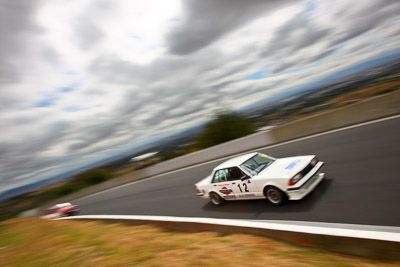 12;1984-Nissan-Bluebird;22-March-2008;Adam-Allan;Australia;Bathurst;FOSC;Festival-of-Sporting-Cars;Improved-Production;Mt-Panorama;NSW;New-South-Wales;auto;clouds;motorsport;movement;racing;sky;speed;wide-angle