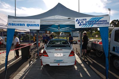 18;15-November-2008;ARC;Australia;Australian-Rally-Championship;Ben-Atkinson;Coffs-Coast;Coffs-Harbour;Evo-5;Mitsubishi-Lancer;Mitsubishi-Lancer-Evolution-V;NSW;NSW-Rally-Championship;NSWRC;Nathan-Quinn;New-South-Wales;atmosphere;auto;crew;members;motorsport;racing;service-centre;service-park;team;wide-angle