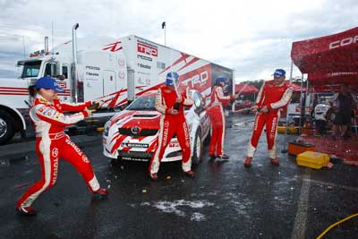 2;15-November-2008;ARC;Australia;Australian-Rally-Championship;Coffs-Coast;Coffs-Harbour;Coral-Taylor;NSW;Neal-Bates;New-South-Wales;Simon-Evans;Sue-Evans;Team-TRD;Topshot;Toyota-TRD-Corolla-S2000;atmosphere;auto;celebration;champagne;crew;mechanics;members;motorsport;racing;service-centre;service-park;team;wide-angle;winning