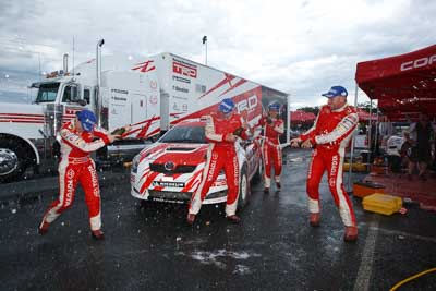 2;15-November-2008;ARC;Australia;Australian-Rally-Championship;Coffs-Coast;Coffs-Harbour;Coral-Taylor;NSW;Neal-Bates;New-South-Wales;Simon-Evans;Sue-Evans;Team-TRD;Toyota-TRD-Corolla-S2000;atmosphere;auto;celebration;champagne;crew;mechanics;members;motorsport;racing;service-centre;service-park;team;wide-angle;winning