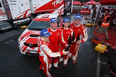 2;15-November-2008;ARC;Australia;Australian-Rally-Championship;Coffs-Coast;Coffs-Harbour;Coral-Taylor;NSW;Neal-Bates;New-South-Wales;Simon-Evans;Sue-Evans;Team-TRD;Toyota-TRD-Corolla-S2000;atmosphere;auto;celebration;champagne;crew;mechanics;members;motorsport;racing;service-centre;service-park;team;wide-angle;winning