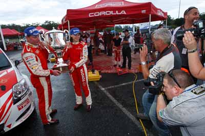 2;15-November-2008;ARC;Australia;Australian-Rally-Championship;Bob-Seary;Coffs-Coast;Coffs-Harbour;Coral-Taylor;Joel-Strickland;NSW;Neal-Bates;New-South-Wales;Team-TRD;Toyota-TRD-Corolla-S2000;atmosphere;auto;celebration;crew;mechanics;members;motorsport;photographers;racing;service-centre;service-park;team;trophy;wide-angle;winning