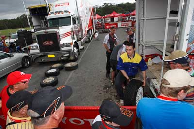 16-November-2008;ARC;Australia;Australian-Rally-Championship;Coffs-Coast;Coffs-Harbour;Michelin;NSW;New-South-Wales;auto;heat-gun;motorsport;racing;service-centre;service-park;spectators;technician;tyres;wide-angle