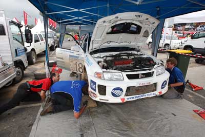 18;16-November-2008;ARC;Australia;Australian-Rally-Championship;Ben-Atkinson;Coffs-Coast;Coffs-Harbour;Evo-5;Mitsubishi-Lancer;Mitsubishi-Lancer-Evolution-V;NSW;NSW-Rally-Championship;NSWRC;Nathan-Quinn;New-South-Wales;auto;crew;mechanics;motorsport;racing;service;service-centre;service-park;team;wide-angle