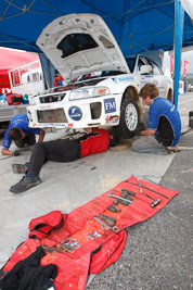 18;16-November-2008;ARC;Australia;Australian-Rally-Championship;Ben-Atkinson;Coffs-Coast;Coffs-Harbour;Evo-5;Mitsubishi-Lancer;Mitsubishi-Lancer-Evolution-V;NSW;NSW-Rally-Championship;NSWRC;Nathan-Quinn;New-South-Wales;auto;crew;mechanics;motorsport;racing;service;service-centre;service-park;team;wide-angle