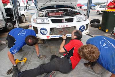 18;16-November-2008;ARC;Australia;Australian-Rally-Championship;Ben-Atkinson;Coffs-Coast;Coffs-Harbour;Evo-5;Mitsubishi-Lancer;Mitsubishi-Lancer-Evolution-V;NSW;NSW-Rally-Championship;NSWRC;Nathan-Quinn;New-South-Wales;auto;crew;mechanics;motorsport;racing;service;service-centre;service-park;team;wide-angle