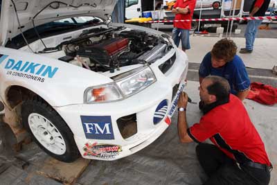 18;16-November-2008;ARC;Australia;Australian-Rally-Championship;Ben-Atkinson;Coffs-Coast;Coffs-Harbour;Evo-5;Mitsubishi-Lancer;Mitsubishi-Lancer-Evolution-V;NSW;NSW-Rally-Championship;NSWRC;Nathan-Quinn;New-South-Wales;auto;crew;mechanics;motorsport;racing;service;service-centre;service-park;team;wide-angle