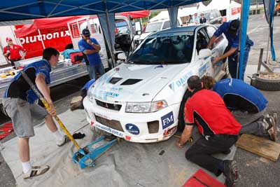 18;16-November-2008;ARC;Australia;Australian-Rally-Championship;Ben-Atkinson;Coffs-Coast;Coffs-Harbour;Evo-5;Mitsubishi-Lancer;Mitsubishi-Lancer-Evolution-V;NSW;NSW-Rally-Championship;NSWRC;Nathan-Quinn;New-South-Wales;auto;crew;mechanics;motorsport;racing;service;service-centre;service-park;team;wide-angle