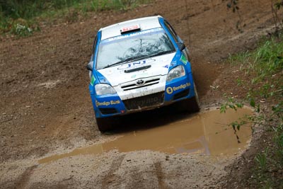 7;16-November-2008;ARC;Australia;Australian-Rally-Championship;Coffs-Coast;Coffs-Harbour;Glen-Raymond;Matt-Raymond;NSW;New-South-Wales;Toyota-Corolla-Sportivo;auto;dirt;motorsport;mud;racing;rain;special-stage;splash;super-telephoto;water