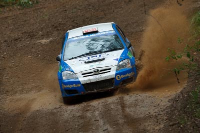 7;16-November-2008;ARC;Australia;Australian-Rally-Championship;Coffs-Coast;Coffs-Harbour;Glen-Raymond;Matt-Raymond;NSW;New-South-Wales;Toyota-Corolla-Sportivo;auto;dirt;motorsport;mud;racing;rain;special-stage;splash;super-telephoto;water