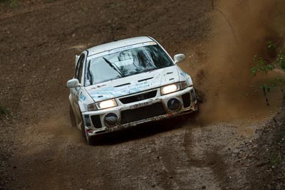 18;16-November-2008;ARC;Australia;Australian-Rally-Championship;Ben-Atkinson;Coffs-Coast;Coffs-Harbour;Evo-5;Mitsubishi-Lancer;Mitsubishi-Lancer-Evolution-V;NSW;NSW-Rally-Championship;NSWRC;Nathan-Quinn;New-South-Wales;auto;dirt;motorsport;mud;racing;rain;special-stage;splash;super-telephoto;water