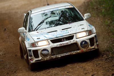 18;16-November-2008;ARC;Australia;Australian-Rally-Championship;Ben-Atkinson;Coffs-Coast;Coffs-Harbour;Evo-5;Mitsubishi-Lancer;Mitsubishi-Lancer-Evolution-V;NSW;NSW-Rally-Championship;NSWRC;Nathan-Quinn;New-South-Wales;auto;dirt;motorsport;mud;racing;rain;special-stage;splash;super-telephoto;water