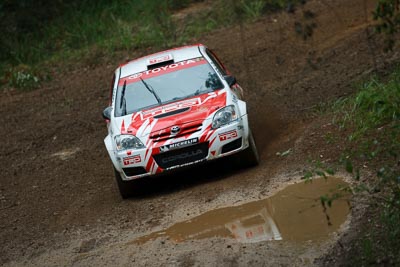 23;16-November-2008;ARC;Anne-Gigney;Australia;Australian-Rally-Championship;Coffs-Coast;Coffs-Harbour;NSW;New-South-Wales;Paul-Gover;Toyota-Corolla-Sportivo;auto;dirt;motorsport;mud;racing;rain;special-stage;splash;super-telephoto;water