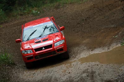 24;16-November-2008;ARC;Australia;Australian-Rally-Championship;Coffs-Coast;Coffs-Harbour;Evo-7;Jo-Cadman;John-Mitchell;Mitsubishi-Lancer;Mitsubishi-Lancer-Evolution-VII;NSW;NSW-Rally-Championship;NSWRC;New-South-Wales;auto;dirt;motorsport;mud;racing;rain;special-stage;splash;super-telephoto;water