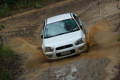 38;16-November-2008;ARC;Arnold-Sluce;Australia;Australian-Rally-Championship;Cameron-Sluce;Coffs-Coast;Coffs-Harbour;NSW;NSW-Rally-Championship;NSWRC;New-South-Wales;Subaru-Impreza-RS;auto;dirt;motorsport;mud;racing;rain;special-stage;splash;super-telephoto;water