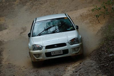 38;16-November-2008;ARC;Arnold-Sluce;Australia;Australian-Rally-Championship;Cameron-Sluce;Coffs-Coast;Coffs-Harbour;NSW;NSW-Rally-Championship;NSWRC;New-South-Wales;Subaru-Impreza-RS;auto;dirt;motorsport;mud;racing;rain;special-stage;splash;super-telephoto;water