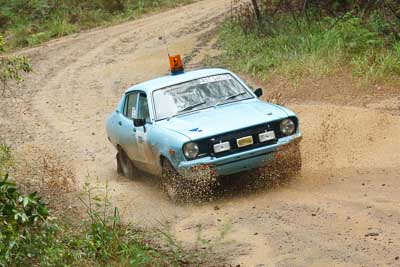 16-November-2008;ARC;Australia;Australian-Rally-Championship;Coffs-Coast;Coffs-Harbour;NSW;New-South-Wales;auto;dirt;fast-sweep;motorsport;mud;official;officials;racing;rain;special-stage;splash;telephoto;water