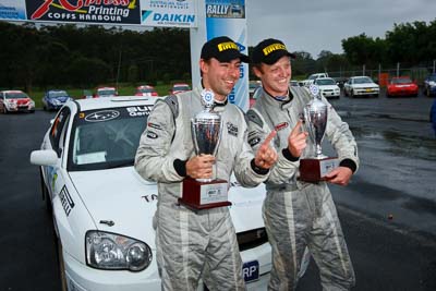 3;16-November-2008;ARC;Australia;Australian-Rally-Championship;Chris-Murphy;Coffs-Coast;Coffs-Harbour;Eli-Evans;NSW;New-South-Wales;Subaru-Impreza-WRX-STI;auto;celebration;motorsport;podium;racing;trophy;wide-angle