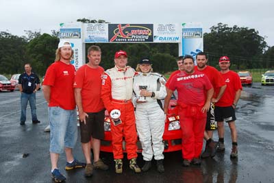 21;16-November-2008;ARC;Australia;Australian-Rally-Championship;Coffs-Coast;Coffs-Harbour;Dennis-Dunlop;Evo-7;Jacqueline-Dunlop;Mitsubishi-Lancer;Mitsubishi-Lancer-Evolution-VII;NSW;New-South-Wales;auto;celebration;motorsport;podium;racing;trophy;wide-angle