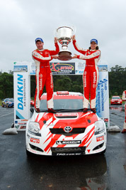 2;16-November-2008;ARC;Australia;Australian-Rally-Championship;Coffs-Coast;Coffs-Harbour;Coral-Taylor;NSW;Neal-Bates;New-South-Wales;Team-TRD;Toyota-TRD-Corolla-S2000;auto;celebration;motorsport;podium;racing;trophy;wide-angle