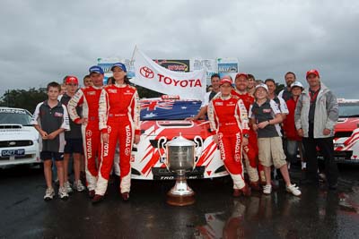 2;16-November-2008;ARC;Australia;Australian-Rally-Championship;Coffs-Coast;Coffs-Harbour;Coral-Taylor;NSW;Neal-Bates;New-South-Wales;Team-TRD;Toyota-TRD-Corolla-S2000;auto;celebration;crew;flag;mechanics;members;motorsport;podium;racing;team;wide-angle