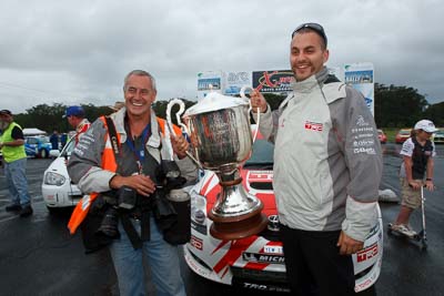 16-November-2008;ARC;Australia;Australian-Rally-Championship;Bob-Seary;Coffs-Coast;Coffs-Harbour;NSW;New-South-Wales;Team-TRD;atmosphere;auto;celebration;crew;mechanic;motorsport;photographer;podium;racing;team-member;trophy;wide-angle